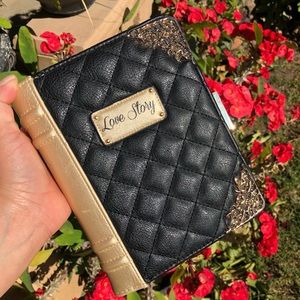ALDO Love Story book shaped clutch crossbody